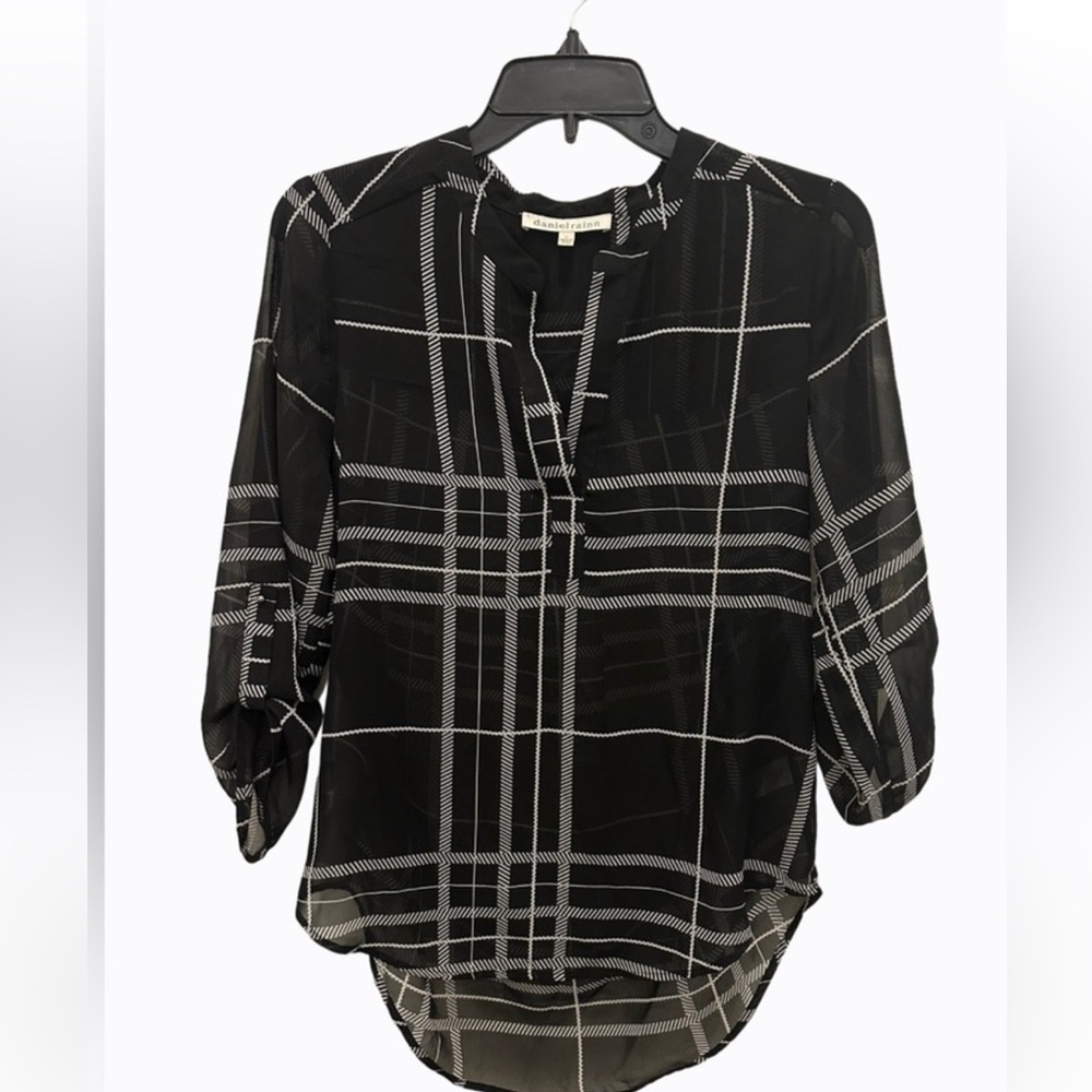 Blouse with black cami underneath sheer blouse